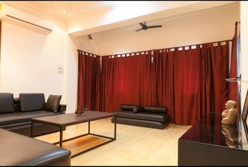 Living Room in 1 BHK Apartment at Tulsi Mahal, Khar West – for Rent