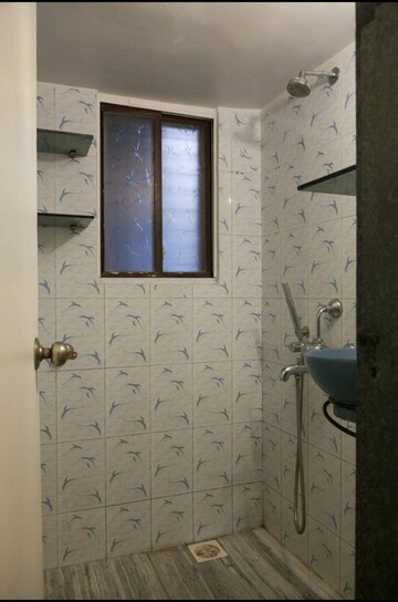 Bathroom in 1 BHK Apartment at Tulsi Mahal, Khar West – for Rent