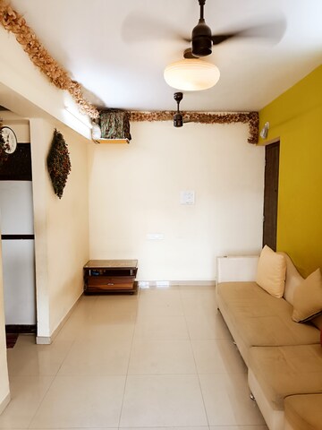 Living Room in 1 BHK Apartment at Golden Tower, Sector 24 Taloja – for Rent