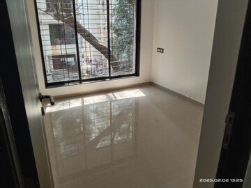 Room in 2 BHK Apartment at Sampada CHS Goregaon, Goregaon West – for Rent