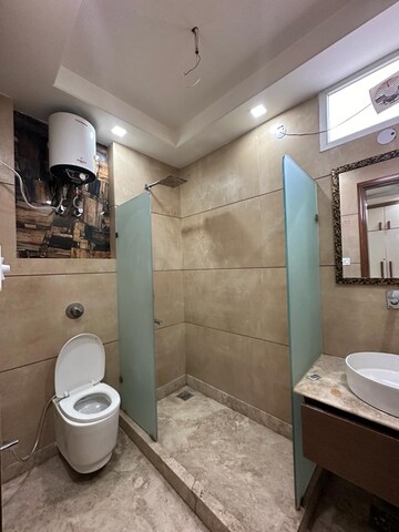 Bathroom in 3 BHK Builder Floor at Paschim Vihar – for Rent