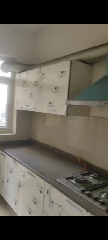 Kitchen in 3 BHK Apartment at Emaar Palm Gardens, Sector 83 – for Sale