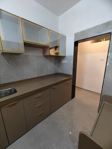 Kitchen in 1 BHK Apartment at RNA NG Aroma, Navghar – for Sale