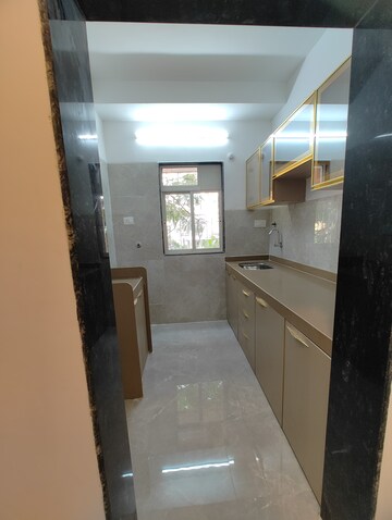 Kitchen in 1 BHK Apartment at RNA NG Aroma, Navghar – for Sale