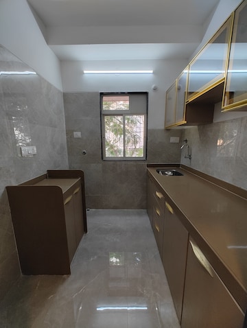 Kitchen in 1 BHK Apartment at RNA NG Aroma, Navghar – for Sale