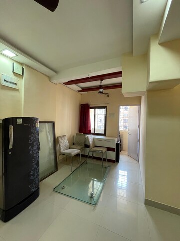 Living Room in 2 BHK Apartment at Versova Heights, Versova – for Rent