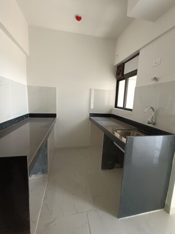 Kitchen in 1 BHK Apartment at Runwal Gardens, Dombivli East – for Rent