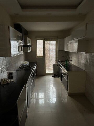 Kitchen in 2 BHK Apartment at Prateek Wisteria, Sector 77 – for Rent