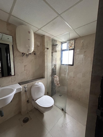Bathroom in 2 BHK Apartment at Prateek Wisteria, Sector 77 – for Rent