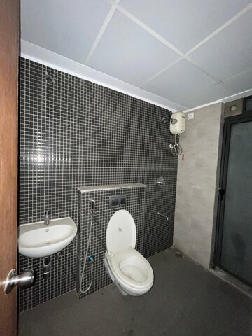 Bathroom in 1 BHK Apartment at Lodha Palava Downtown, Dombivli East – for Rent