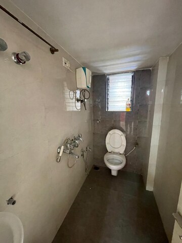 Bathroom in 2 BHK Apartment at Salasar Aanand, Mira Road – for Rent