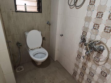 Bathroom in 2 BHK Apartment at Salasar Aanand, Mira Road – for Rent