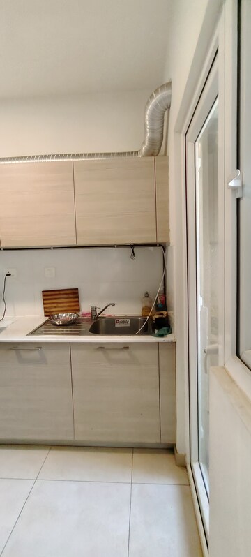 Kitchen in 3 BHK Apartment at Bhartiya Nikoo Homes Phase 2, Thanisandra Main Road – for Rent