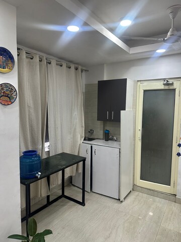 Living Room in 1 RK Apartment at South Extension I – for Rent