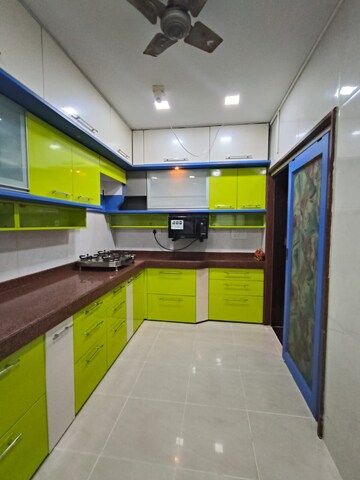 Kitchen in 2 BHK Apartment at Millennium Gardens, Malad East – for Rent