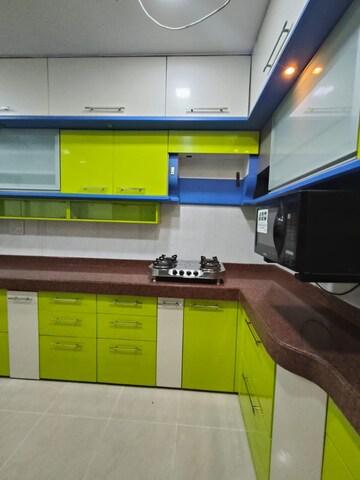 Kitchen in 2 BHK Apartment at Millennium Gardens, Malad East – for Rent