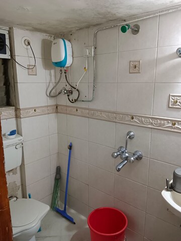 Bathroom in 2 BHK Apartment at Sai Krishna Kunj, Andheri West – for Rent