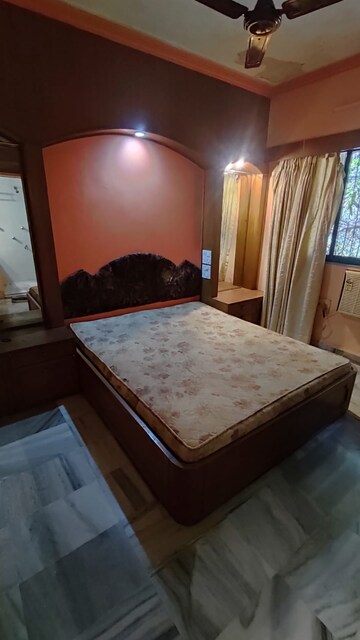 Bedroom in 2 BHK Apartment at Ajit Park CHS, Malad West – for Rent