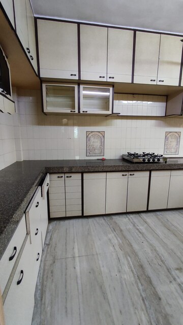 Kitchen in 2 BHK Apartment at Ajit Park CHS, Malad West – for Rent