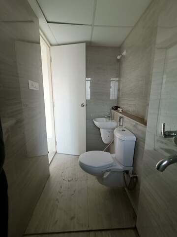 Bathroom in 1 BHK Apartment at Runwal Gardens, Dombivli East – for Rent