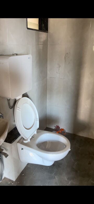 Bathroom in 1 BHK Apartment at Puraniks Kanchanpushp Complex, Kavesar – for Rent