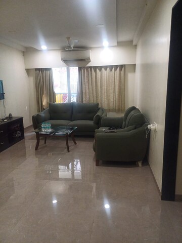 Living Room in 2 BHK Apartment at Parinee Aria, Juhu – for Rent
