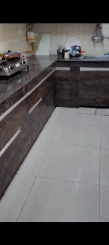 Kitchen in 3 BHK Apartment at Ajnara Grace, Raj Nagar Extension – for Rent