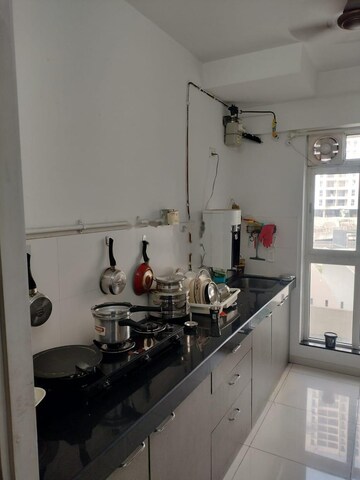 Kitchen in 1.5 BHK Apartment at Godrej Emerald, Ghodbunder Road – for Rent