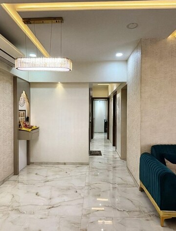 Living Room in 2 BHK Apartment at Rustomjee Urbania Azziano, Majiwada – for Rent