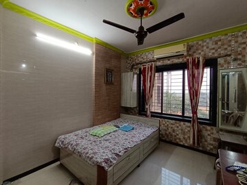 Bedroom in 2 BHK Apartment at Pariwar CHS, Kanjurmarg East – for Rent