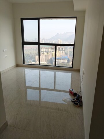 Living Room in 1 BHK Apartment at Lodha Crown Quality Homes, Majiwada – for Rent