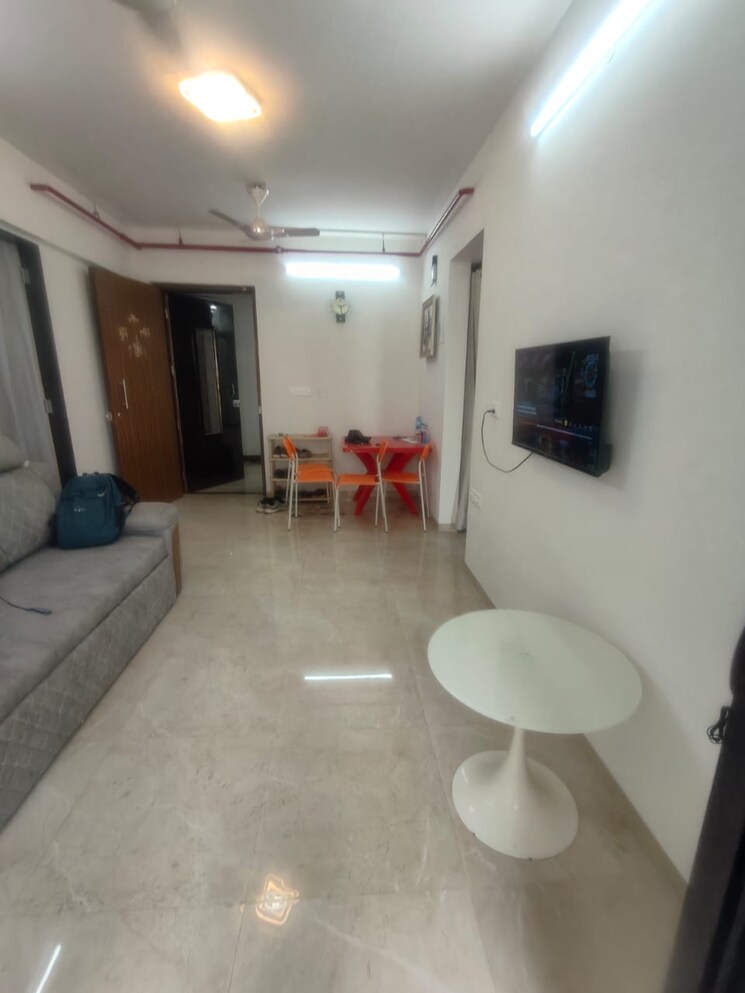 Living Room, micl-aaradhya-highpark-project-2-of-phase-1 1 Bedroom 387 Sq.Ft. Apartment In Dahisar East Mumbai 8158763