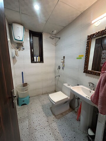 Bathroom in 3 BHK Builder Floor at Ansal API Esencia, Sector 67 – for Rent