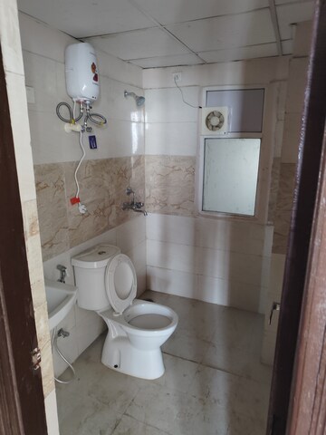 Bathroom in 2 BHK Apartment at Amrapali Golf Homes, Sector 4, Greater Noida – for Rent