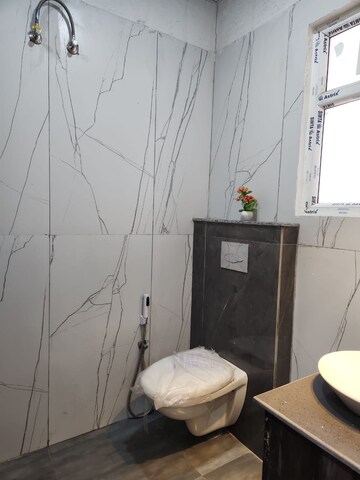 Bathroom in 3 BHK Builder Floor at Gmada Aerocity – for Sale
