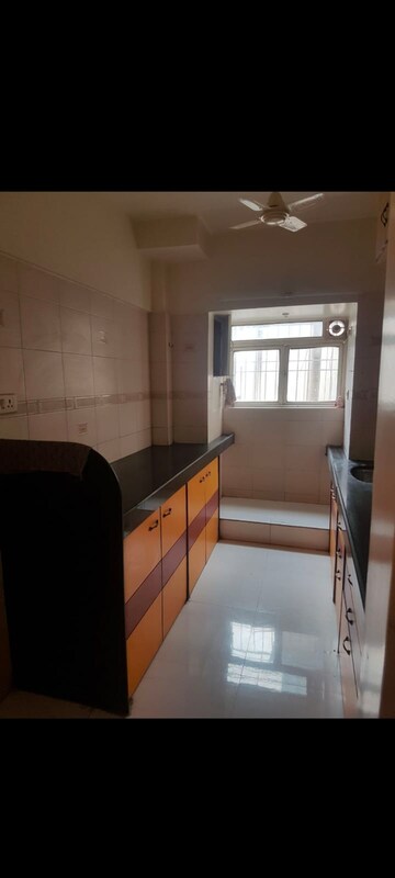 Kitchen in 1 BHK Apartment at Palace Orchard CHS, Mohammadwadi – for Rent