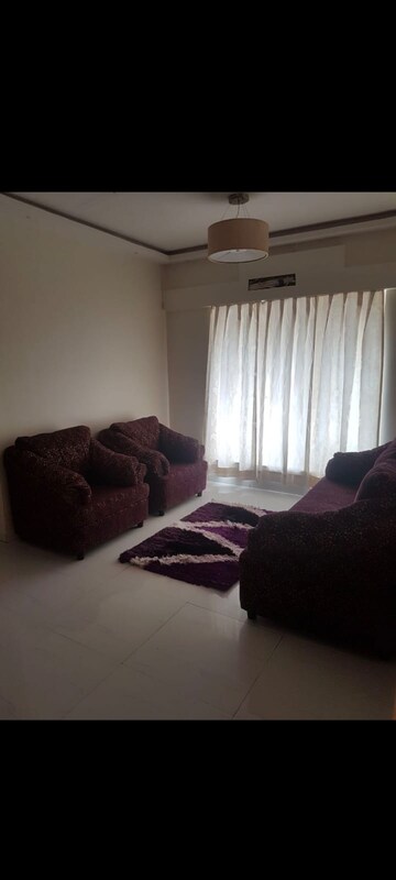 Living Room in 1 BHK Apartment at Palace Orchard CHS, Mohammadwadi – for Rent