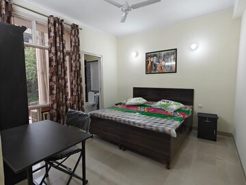 Bedroom in 2 BHK Builder Floor at DLF Star Tower, Sector 30 – for Rent
