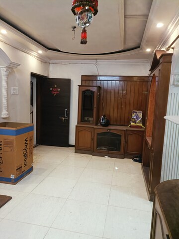 Living Room in 1 BHK Apartment at Brahmand CHS, Brahmand – for Sale