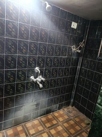 Bathroom in 1 BHK Apartment at Brahmand CHS, Brahmand – for Sale
