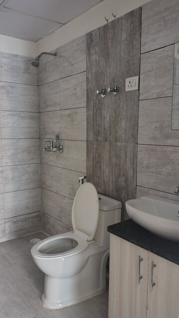 Bathroom in 2.5 BHK Apartment at Gulshan Bellina, Sector 16 Greater Noida – for Rent