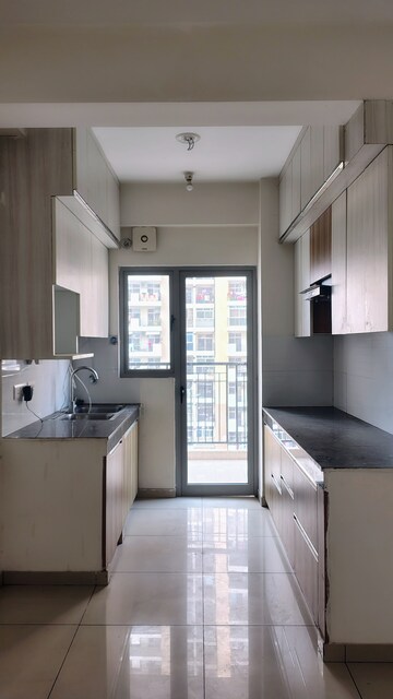 Kitchen in 2.5 BHK Apartment at Gulshan Bellina, Sector 16 Greater Noida – for Rent