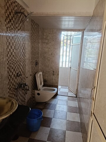 Bathroom in 2 BHK Apartment at Eden Woods complex, Manpada – for Sale