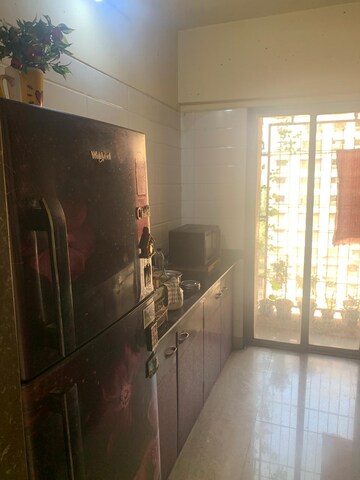 Kitchen in 2 BHK Apartment at Palacia Kingston, Ghodbunder Road – for Rent