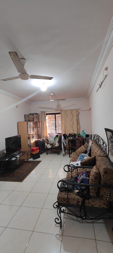 Living Room in 1 BHK Apartment at Magnolia Enclave, Powai – for Rent
