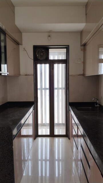 Kitchen in 2 BHK Apartment at Runwal My City Phase II Cluster 05, Dombivli East – for Rent