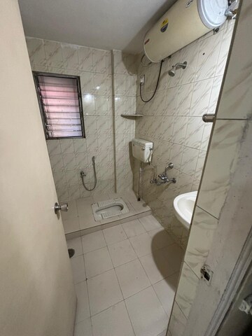 Bathroom in 3 BHK Apartment at Pethkar Shefalika Heights, Kothrud – for Rent