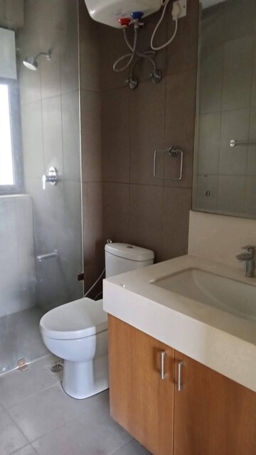 Bathroom in 3 BHK Apartment at Godrej Meridien, Sector 106 – for Rent