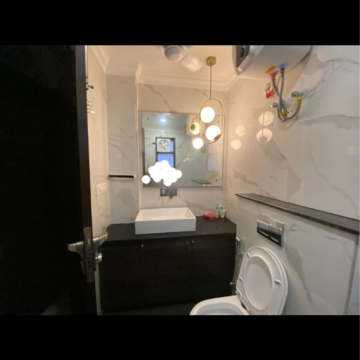 Bathroom in 4 BHK Apartment at Orris Aster Court Premier, Sector 85 – for Sale