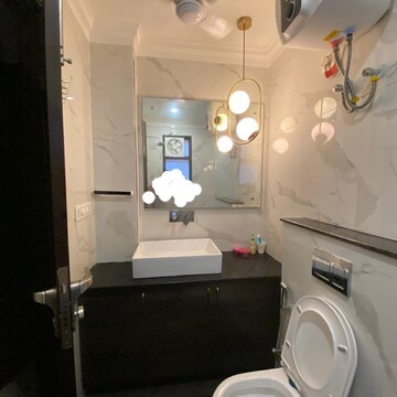 Bathroom in 4 BHK Apartment at Orris Aster Court Premier, Sector 85 – for Sale